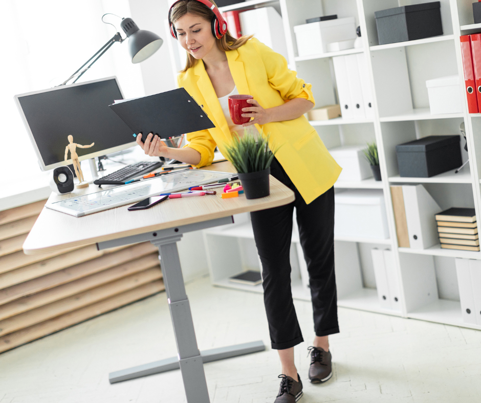 woman working at a standing desk in office